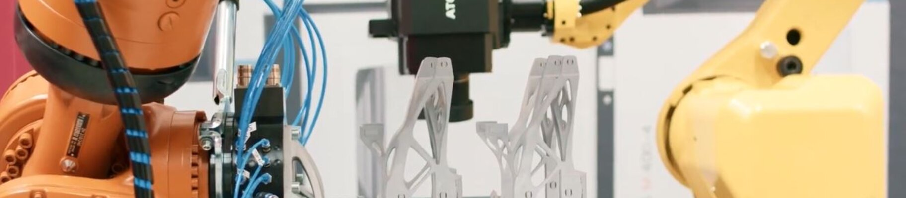 robotic units and additive manufactured brackets